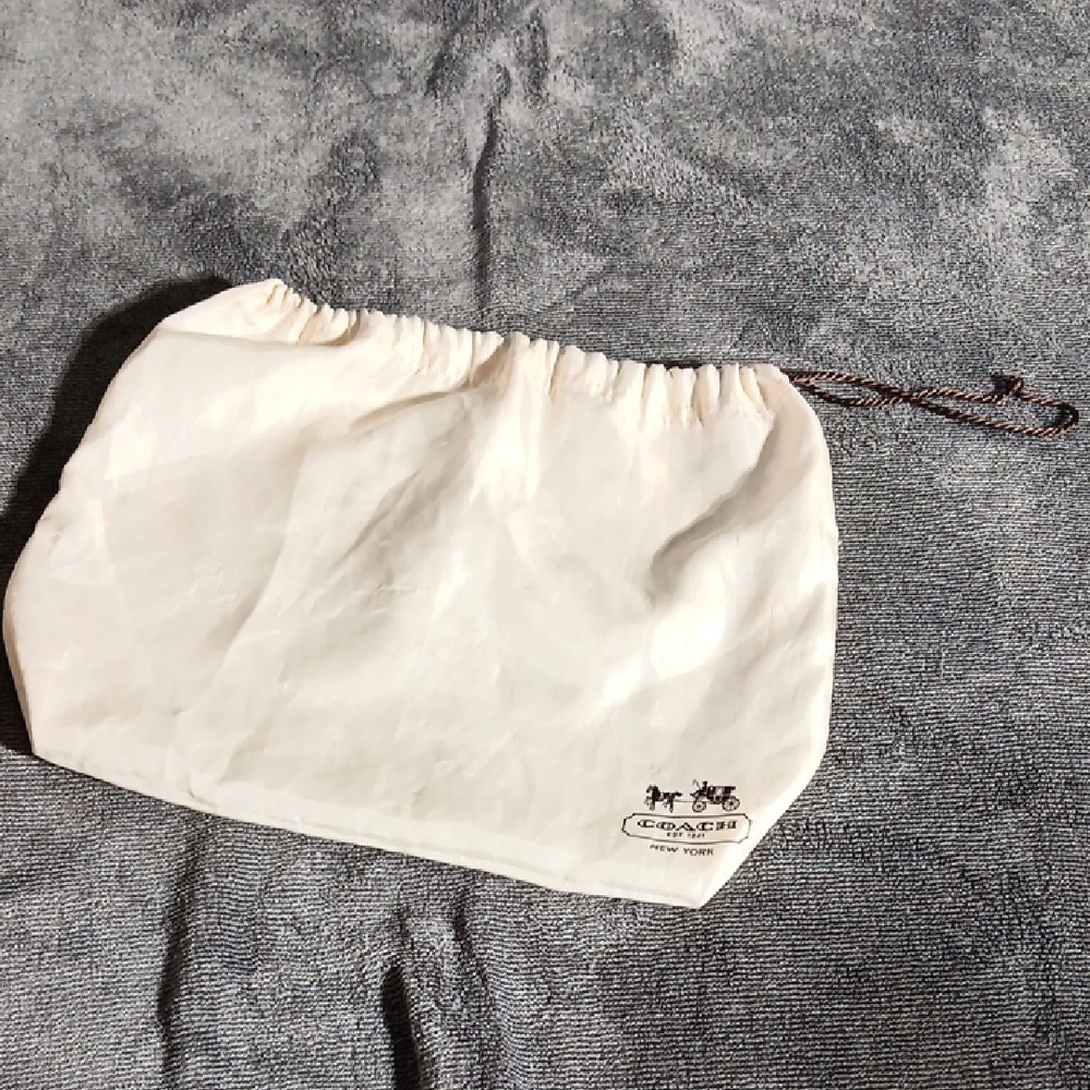 🎉Coach Ivory Drawstring Pouch.